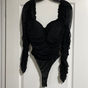 M blanc black bodysuit